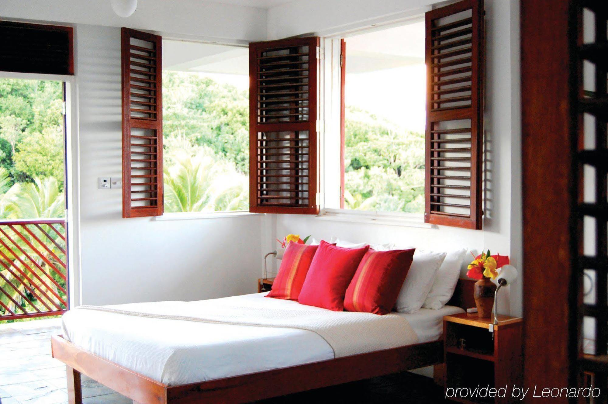 Hotel Calibishie Cove Habitación foto